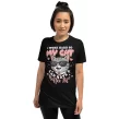 Woman wearing black "I Work Hard So My Cat Has a Better Life" shirt, front-facing pose
