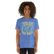 Woman modeling heather blue Spare Human shirt with bold white and yellow text design