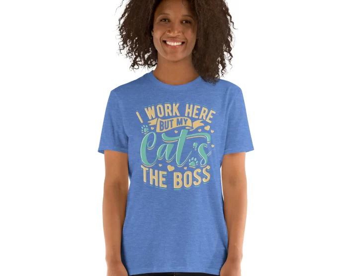 Woman modeling heather blue Spare Human shirt with bold white and yellow text design