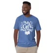 Man wearing blue "My Cat’s Plus One" cat lover t-shirt, front-facing on white background