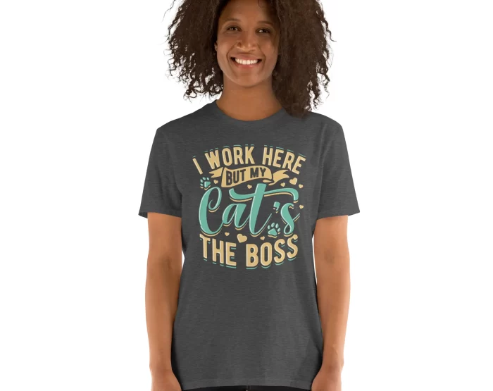 Front view of woman wearing dark gray "I Work Here But My Cat’s the Boss" shirt on white background.