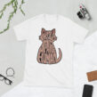 Flat Lay – White Sphynx Cat T-Shirt with Minimal Props