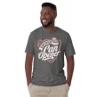 Man wearing Graphite Heather Certified Can Opener t-shirt with hands in pockets, casual pose