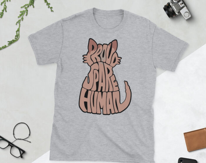Gray Sphynx Cat T-Shirt Flat Lay with Accessories Light gray Sphynx cat t-shirt laid flat with bold Proud Spare Human design in cat silhouette