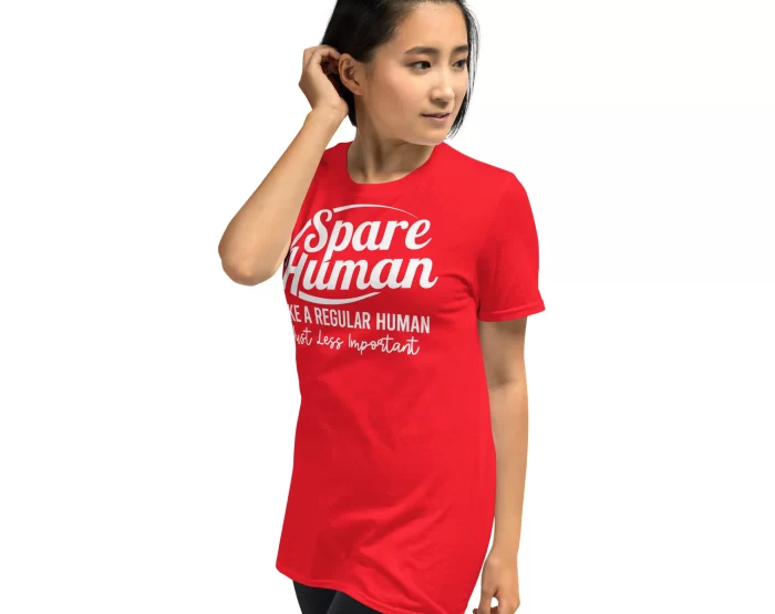 Red Spare Human Shirt Female Pose Woman in red Spare Human tee with ponytail and playful pose