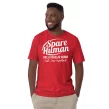 Man wearing red "Spare Human Like a Regular Human" t-shirt, front view