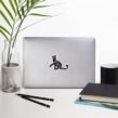 Weatherproof cat sticker reading I Love Rescue Cats placed on laptop in minimalist workspace