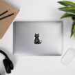 Proud Spare Human sticker centered on closed silver laptop for cat lovers